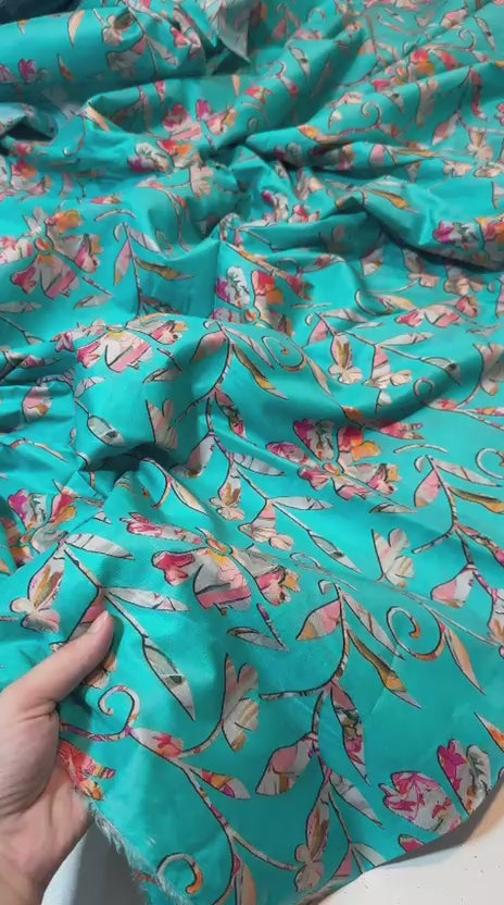 unstitched printed 2-piece lawn suits for just Rs. 1,400.
