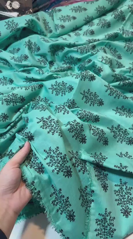 unstitched printed 2-piece lawn suits for just Rs. 1,400