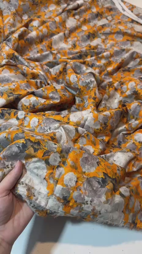 unstitched printed 2-piece lawn suits for just Rs. 1,400.